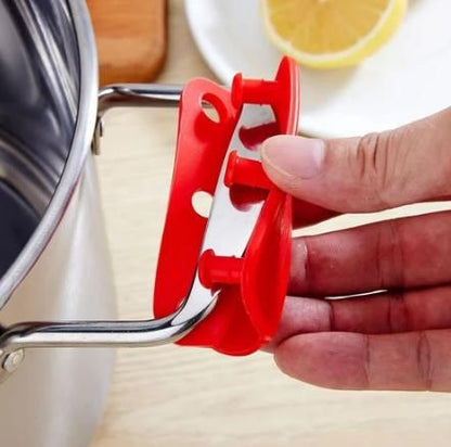 Silicone pot handle holder from 19378 kitchen tool set, heat-resistant silicone with textured grip for safe handling of hot cookware.