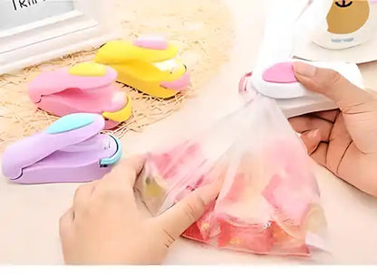 Portable mini food sealer by 19378, handheld heat seal device for sealing plastic, snack, and chip bags for fresh food storage.