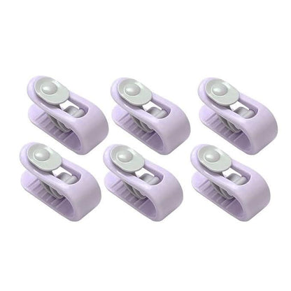 Set of 8 Bedsheet Holder Clips for beds, designed to secure sheets in place for a tidy, wrinkle-free bed.