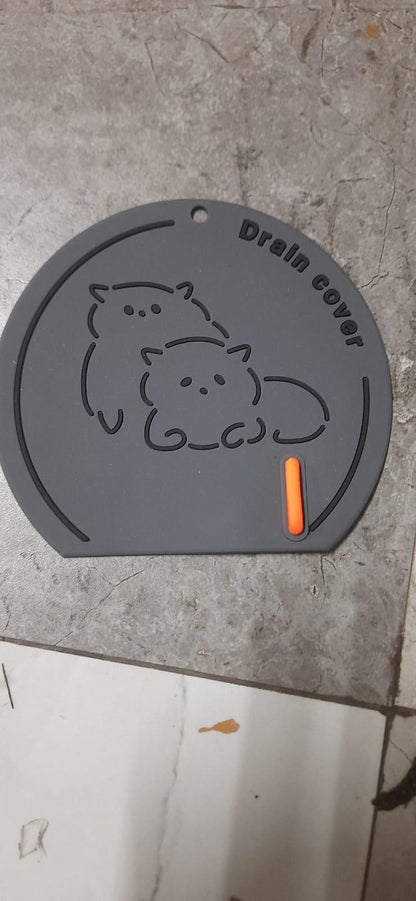 Thick silicone floor drain deodorant cover from 19378 kitchen tool set, designed to fit and seal floor drains effectively.