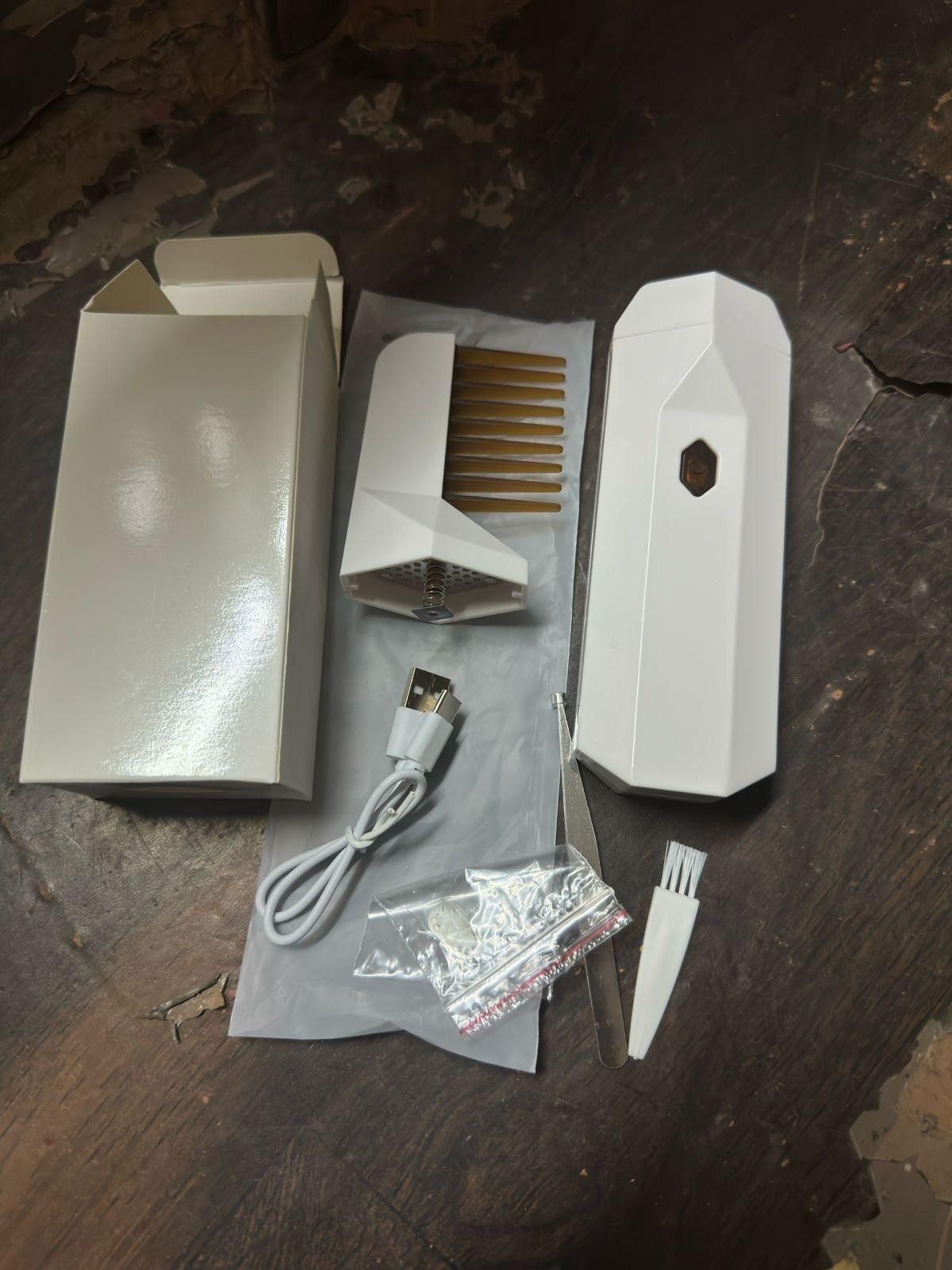Portable multifunctional hair comb with fragrance addition, hand massage feature, and ergonomic design for healthy hair care.