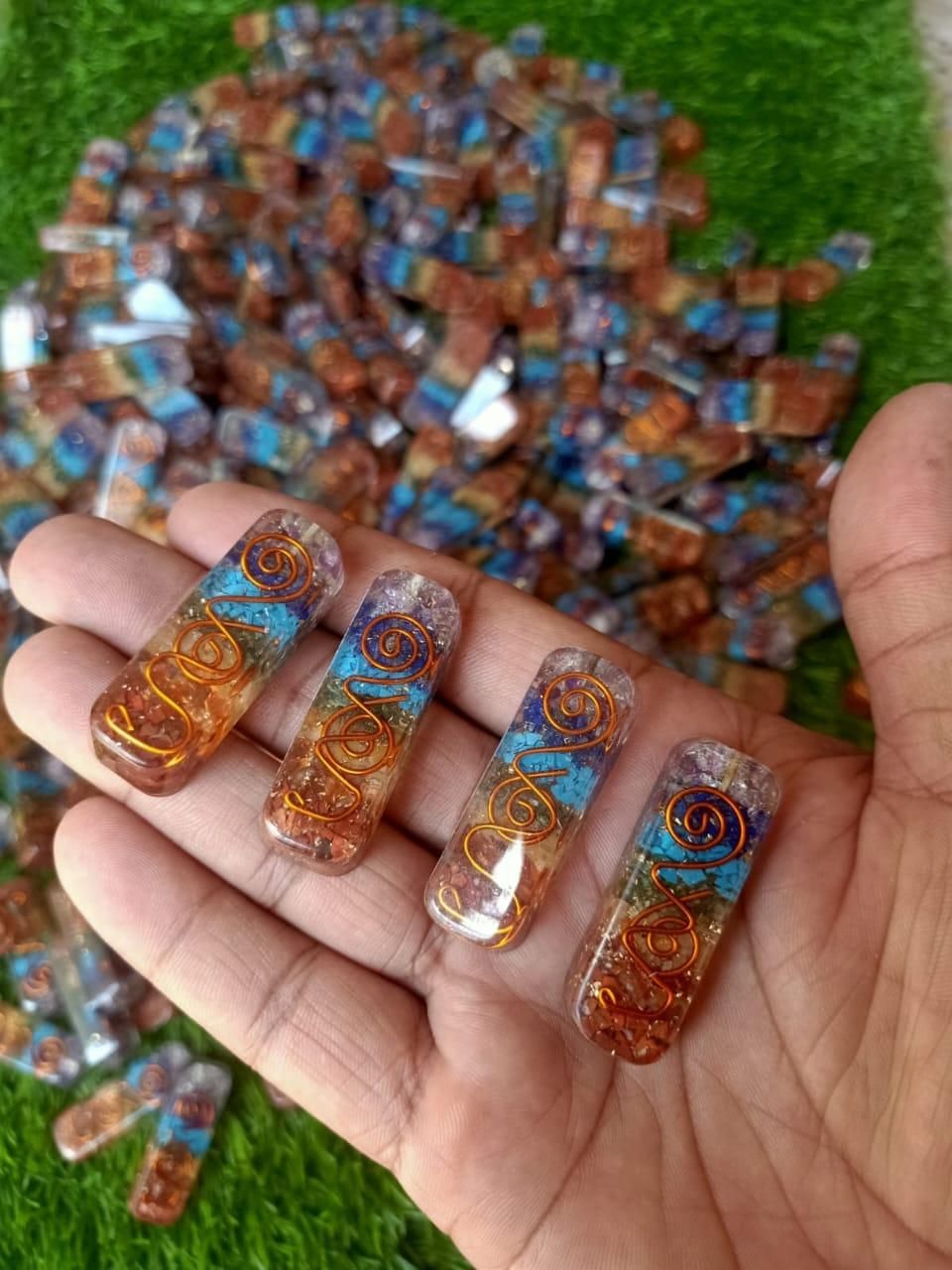 Two titanium quartz stone pendants for pooja, showcasing polished, natural crystal jewelry in a pack of two.