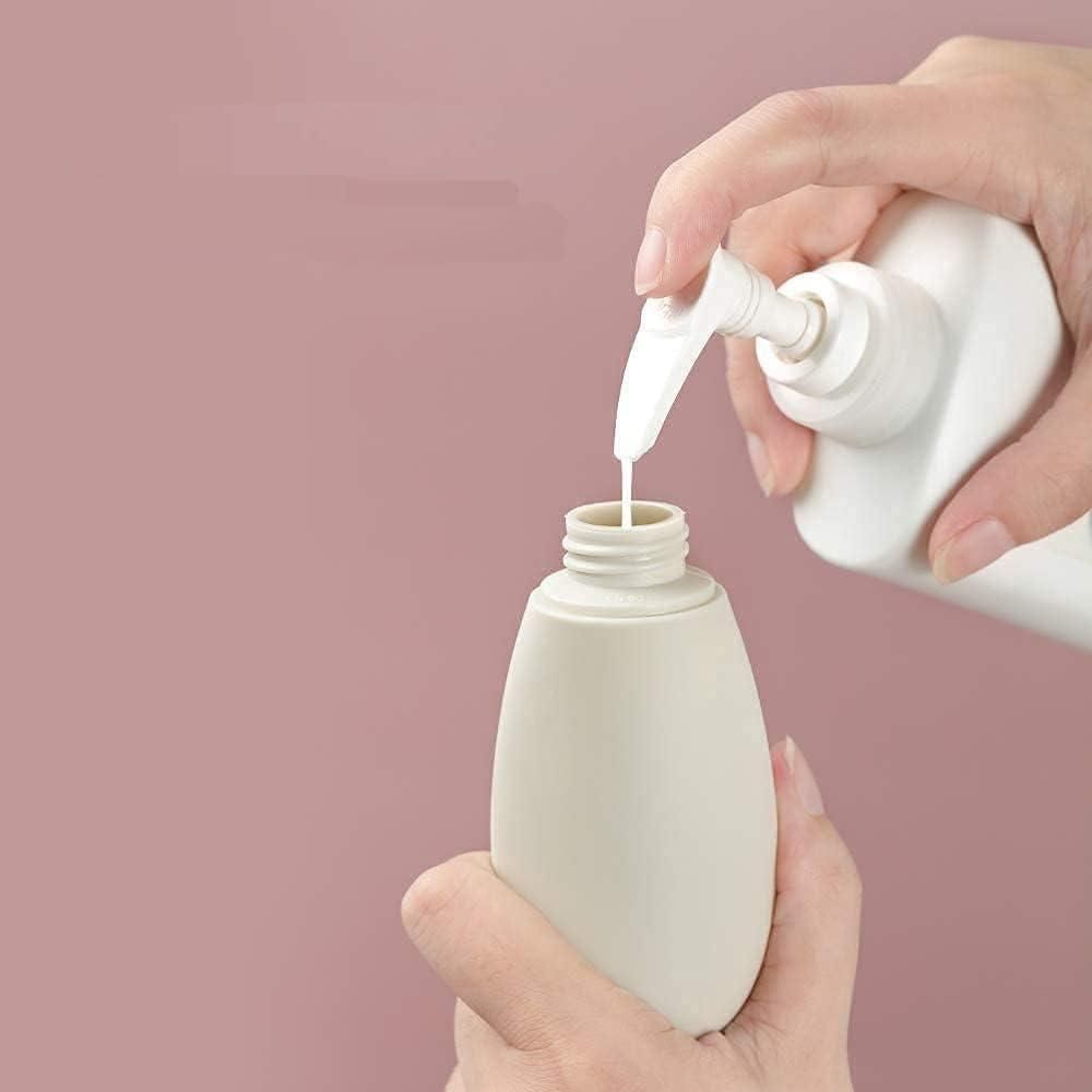 Set of three 60ml travel bottles from 19378, made of clear plastic for shampoo, conditioner, or lotion storage during travel.