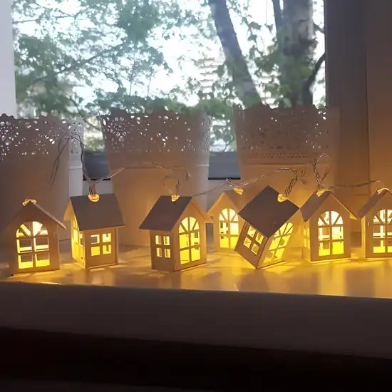 White home string lights used as Diwali decorations, featuring bright glowing bulbs for festive lighting.