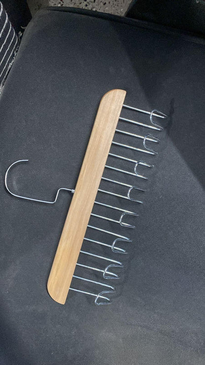 Set of two multifunctional wooden kitchen hangers with metal hooks, ideal for organizing utensils and cookware.
