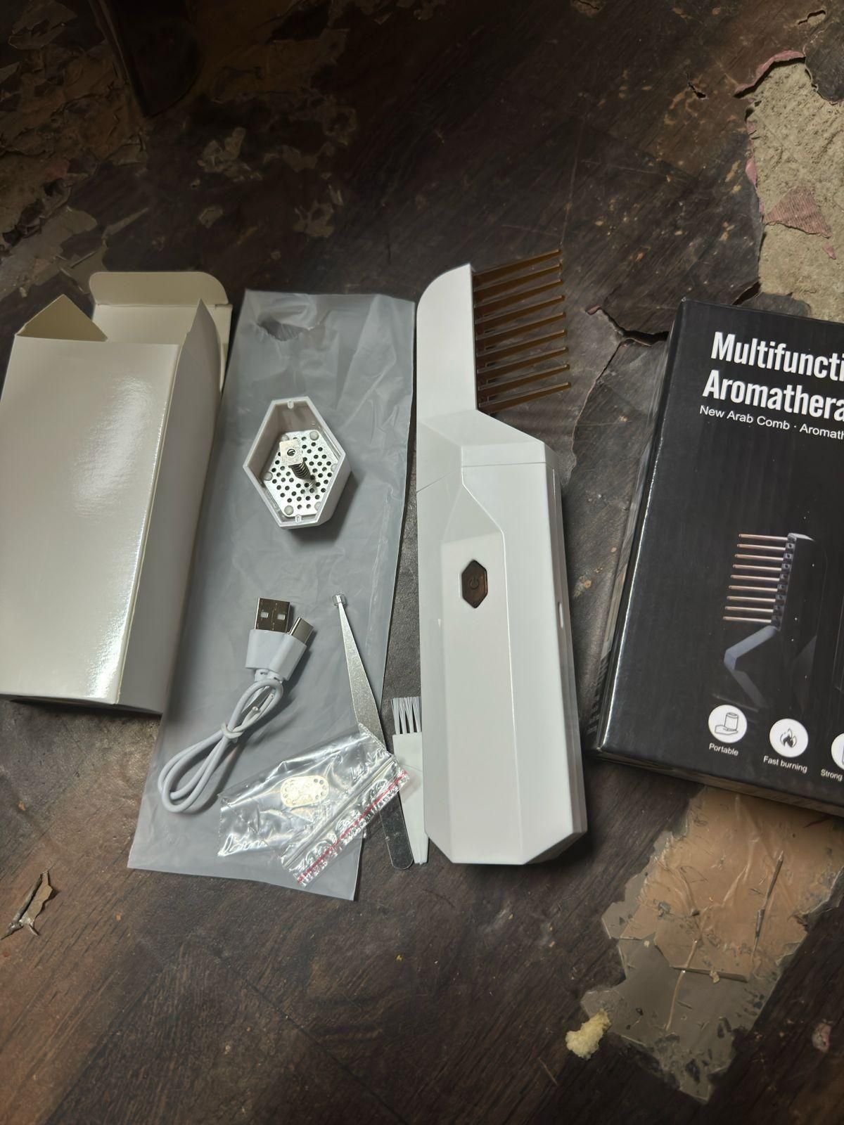 Portable multifunctional hair comb with fragrance addition, hand massage, and styling features, from brand 19378.