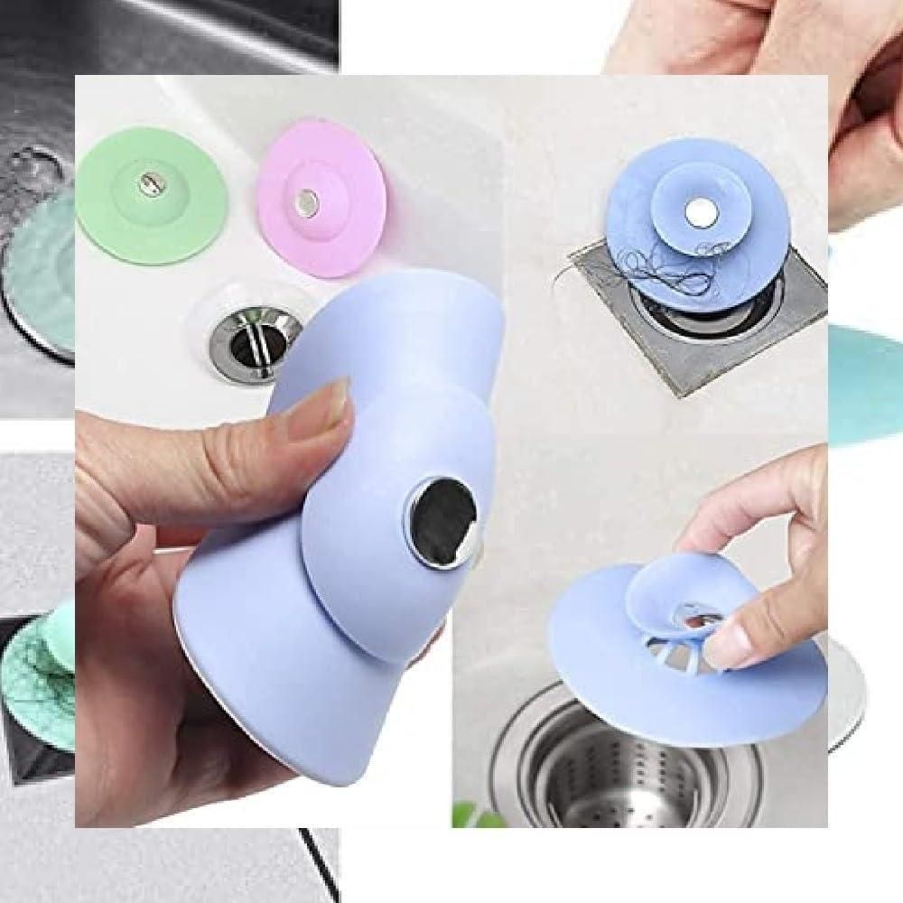Set of three silicone kitchen sink strainers in random colors, designed to catch debris and prevent clogs in household sinks.
