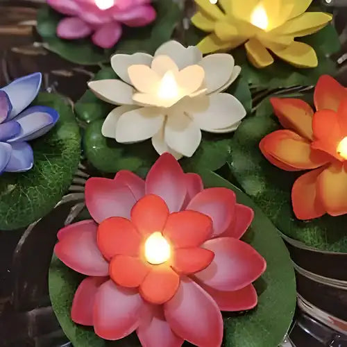 Six flameless lotus flower water sensor LED diyas for Diwali decorations, featuring soft glowing light and intricate floral design.