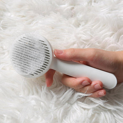 Pet hair removal brush with ergonomic handle, designed to easily remove pet hair from furniture and clothing.