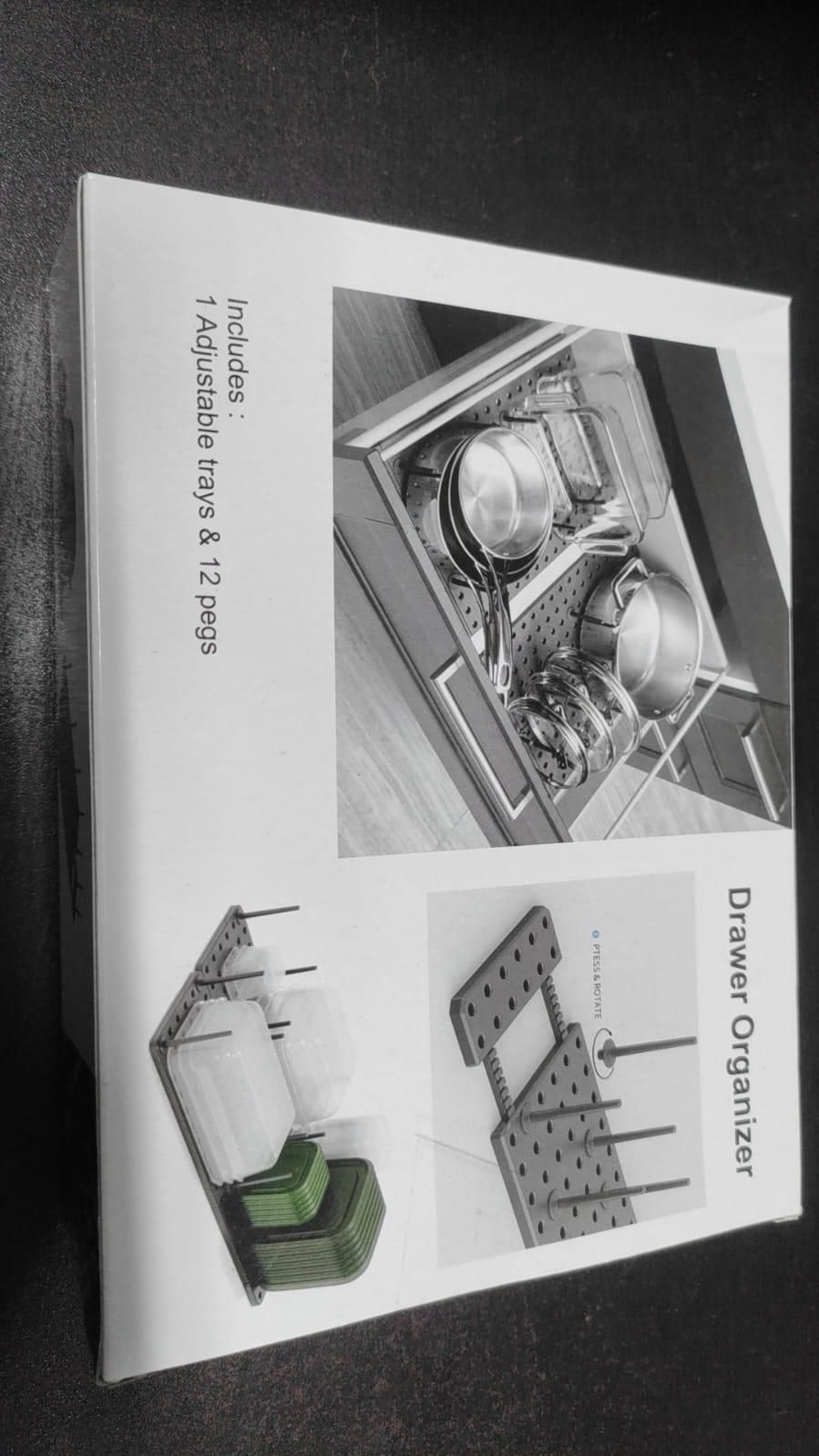Kitchen cupboard drawer organizer with pegboard tray from 19378, ideal for kitchen tool storage and organization.