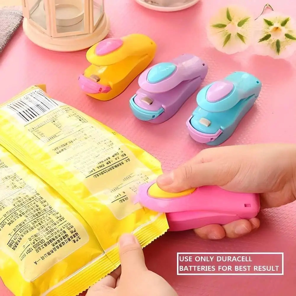 Portable small heat sealer mini sealing machine for food storage, plastic bags, snacks, and vacuum sealing in multicolor.