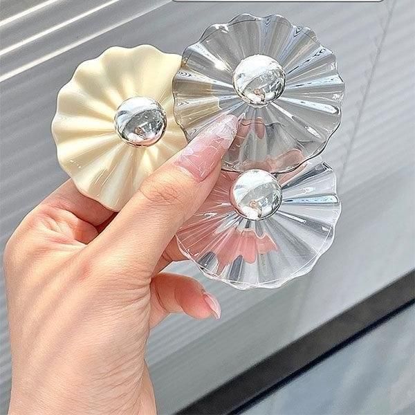 Set of five petal-shaped adhesive wall hooks from 19378, ideal for kitchen organization and hanging lightweight items.