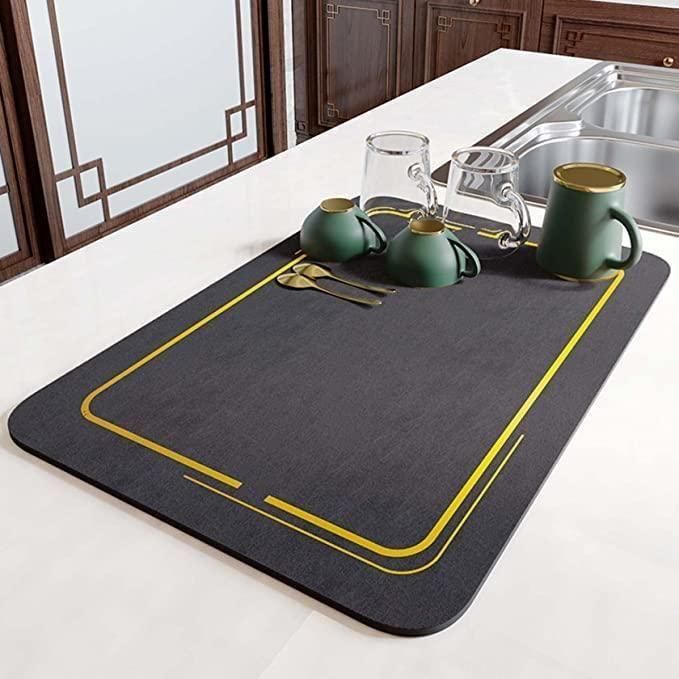 Set of two lightweight, washable quick-drying kitchen mats from 19378, ideal for food prep and countertop protection.