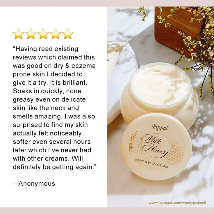 Cream jar of Milk & Honey Gold nourishing hand and body lotion by 6255, with golden packaging and smooth cream inside.