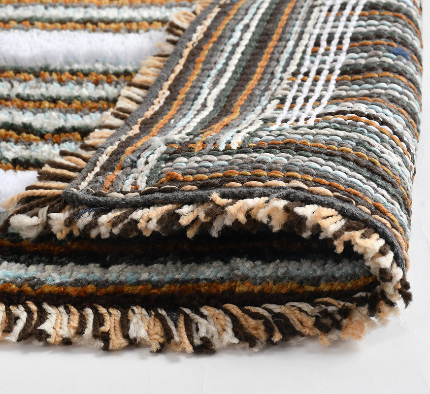 Set of two 40x60cm microfiber anti-skid washable bathmats with soft texture and non-slip backing, ideal for bathroom floors.