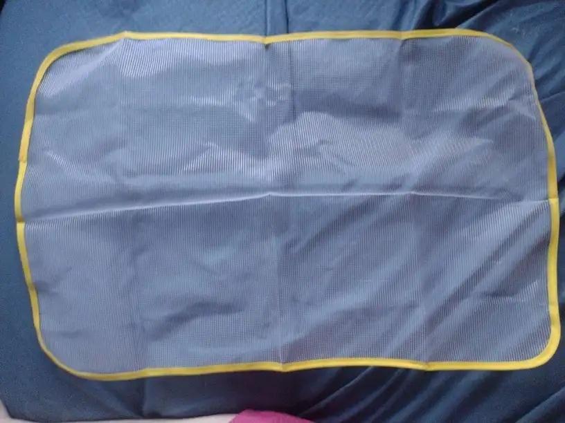 Ironing mesh protective insulation pad for irons, designed to prevent heat damage and improve safety during ironing.