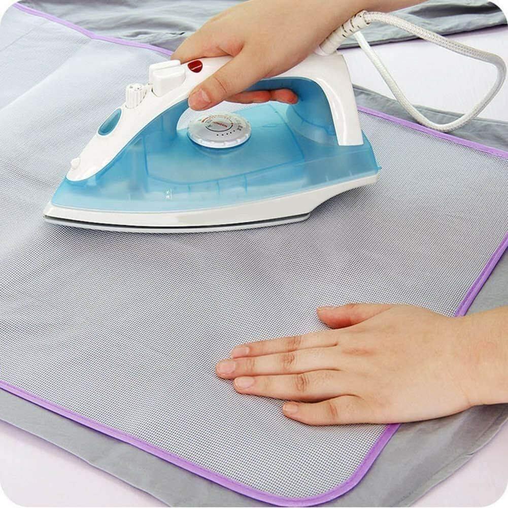Ironing mesh protective insulation pad for irons, black, with a breathable, heat-resistant design for safe ironing.