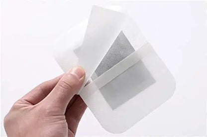 Photo frame of Kinoki Detox Foot Patches pack with 10 foot pads, showcasing the product packaging and individual patches.