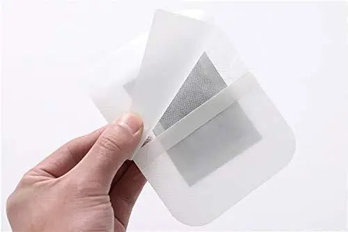 Photo frame of Kinoki Detox Foot Patches pack with 10 foot pads, showcasing the product packaging and individual patches.