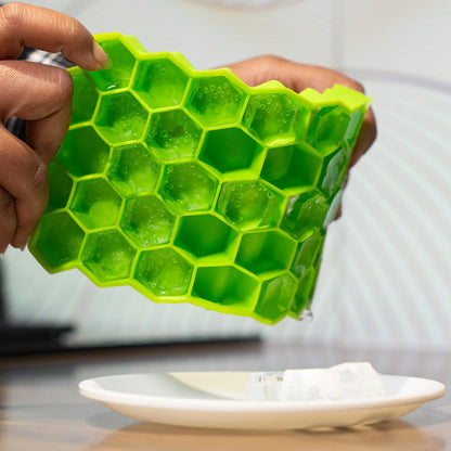 Two Kitchen4U silicone ice cube trays with 37 small honeycomb-shaped ice molds for whiskey, cocktails, and freezing in the fridge.