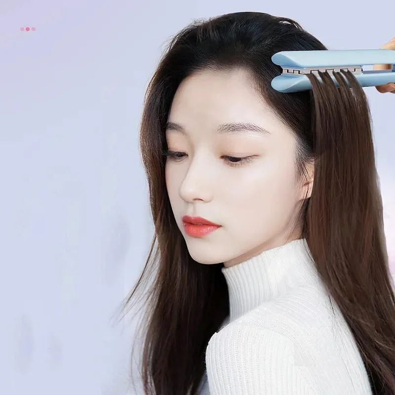 Electric dry and wet hair curler by 18049, dual-use straight and volume hair curling tool with sleek design.