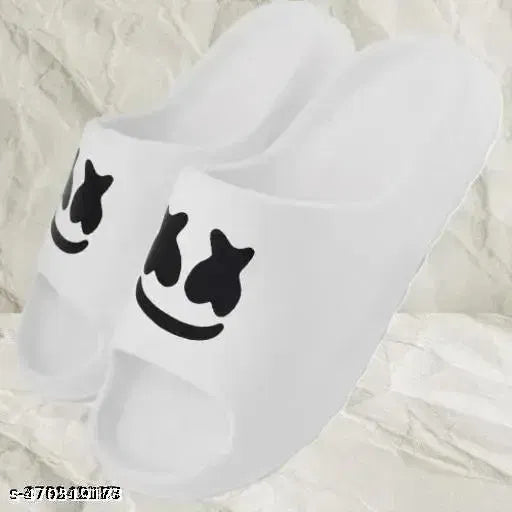 White Smiley Slides slippers by 1765 featuring a cheerful smiley face design and comfortable slip-on style.