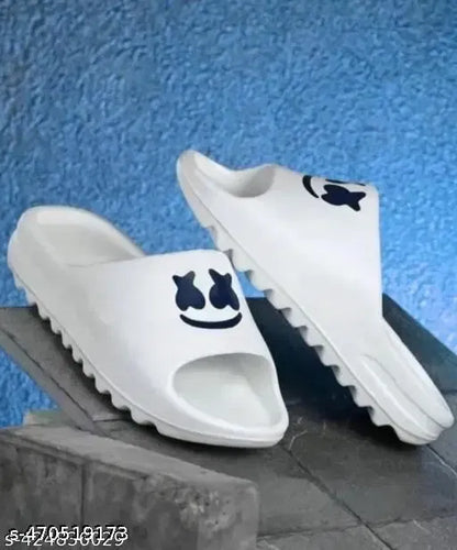 White Smiley Slides slippers by 1765 featuring a playful smiley face design on casual slide sandals.