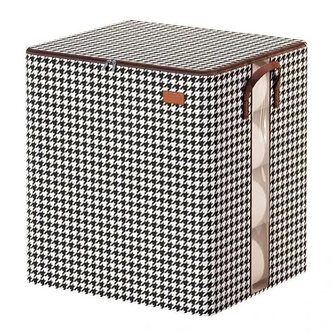 Foldable bedding storage bag with handle, strong zipper, and clear window for easy organization and visibility of blankets or bedding.