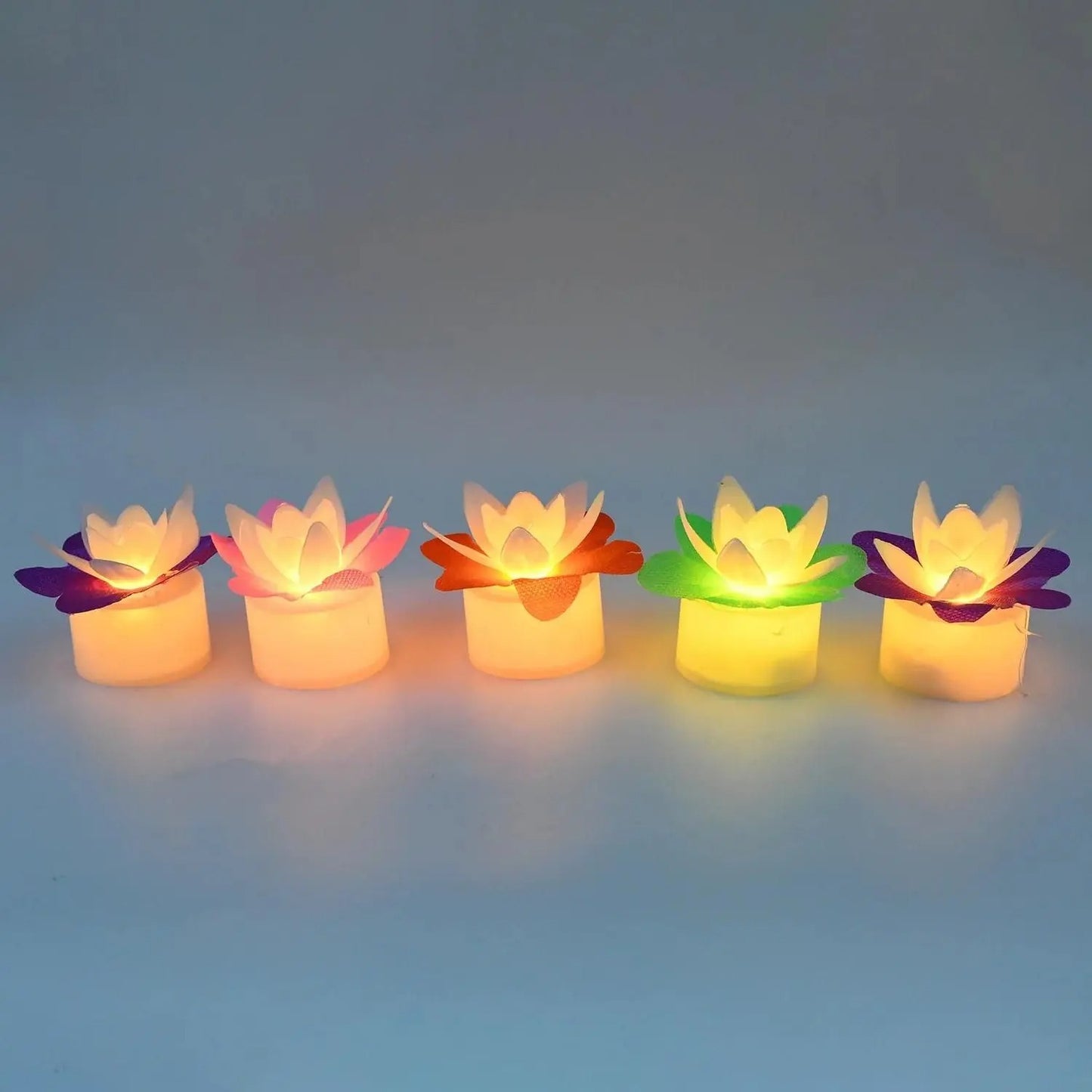 Set of four red and pink LED lotus flower candles for Diwali decoration, featuring decorative candle design by 18051.
