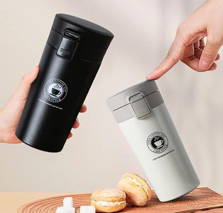 Stainless steel 380ml vacuum tumbler and coffee mug by 18052, featuring a sleek design for hot and cold beverages.