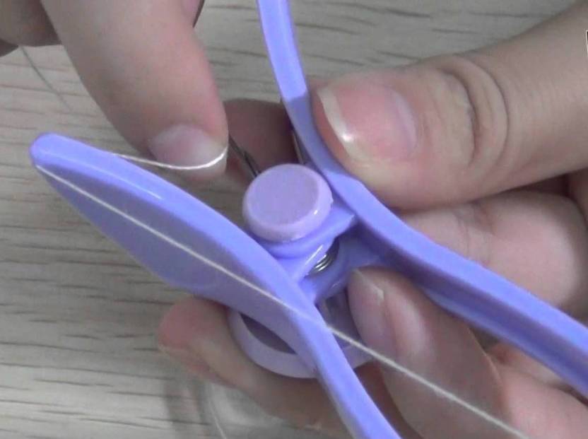 Purple Piesome eyebrow and body hair threading system with tweezers, threading tool, and epilators for women, designed for precise hair removal.