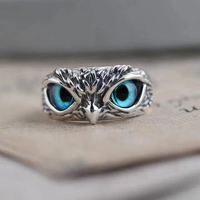Silver plated owl eye ring for men and women, a traditional pooja article featuring detailed owl eye design.