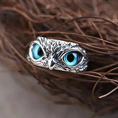 Silver plated owl eye ring for men and women, a stylish Pooja article with intricate design and shiny finish.