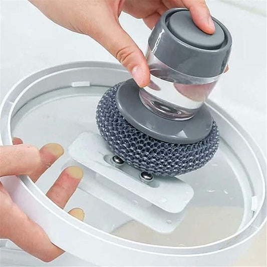 Soap dispensing dish brush with built-in liquid storage and dishwashing lid, ideal for cleaning pots and kitchen dishes.
