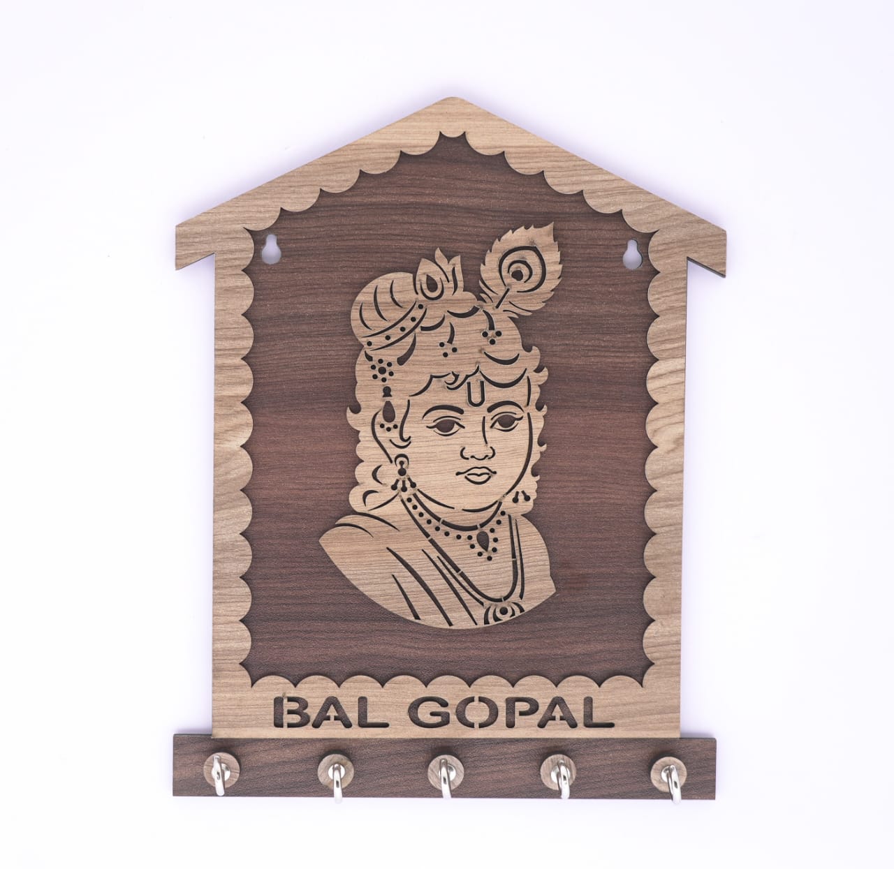 Brown Bal Gopal wooden keyholder with carved design, featuring multiple hooks for organizing keys and small items.
