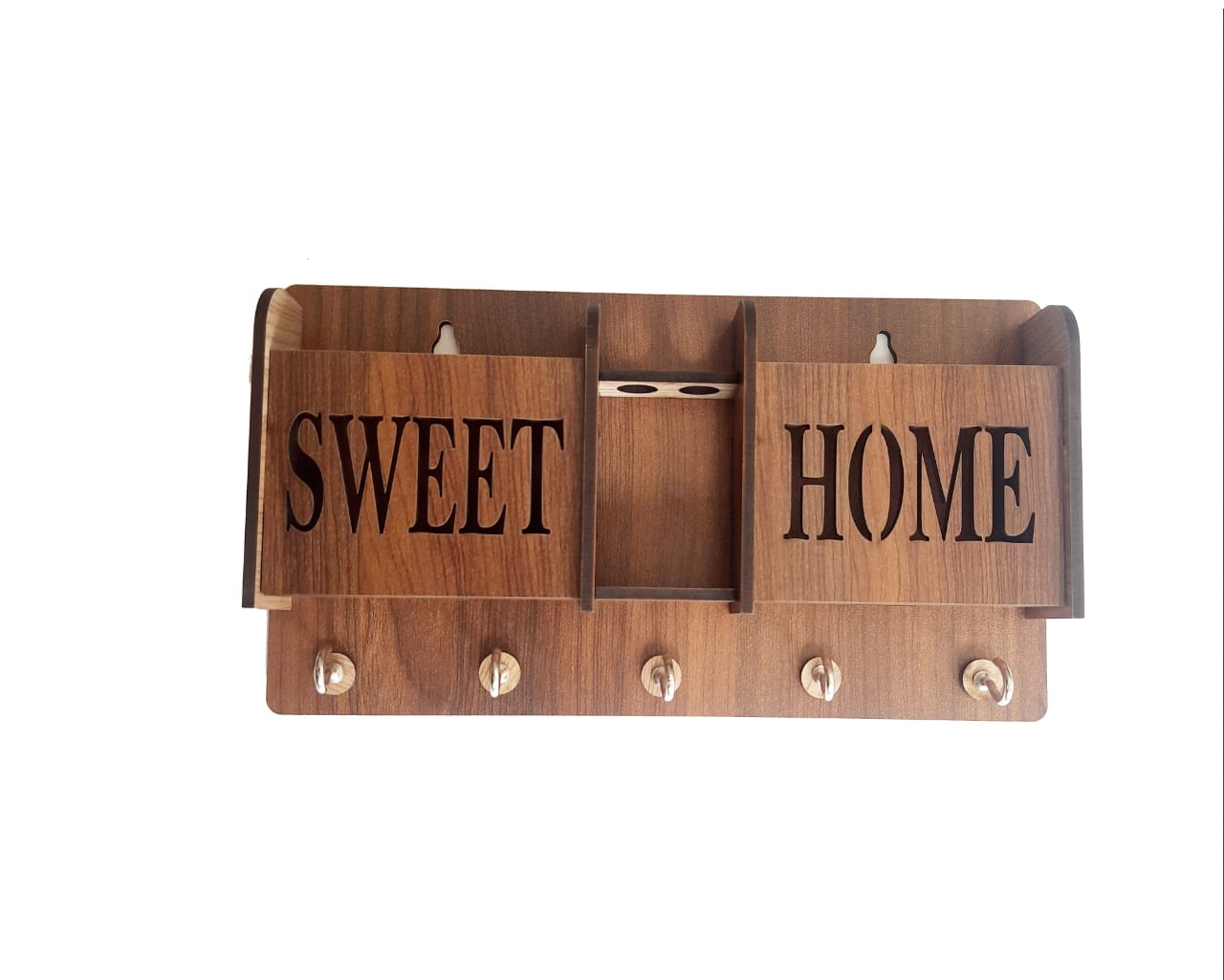 Brown wooden Sweet Home key holder and phone stand with hooks for keys and a phone resting on the stand.