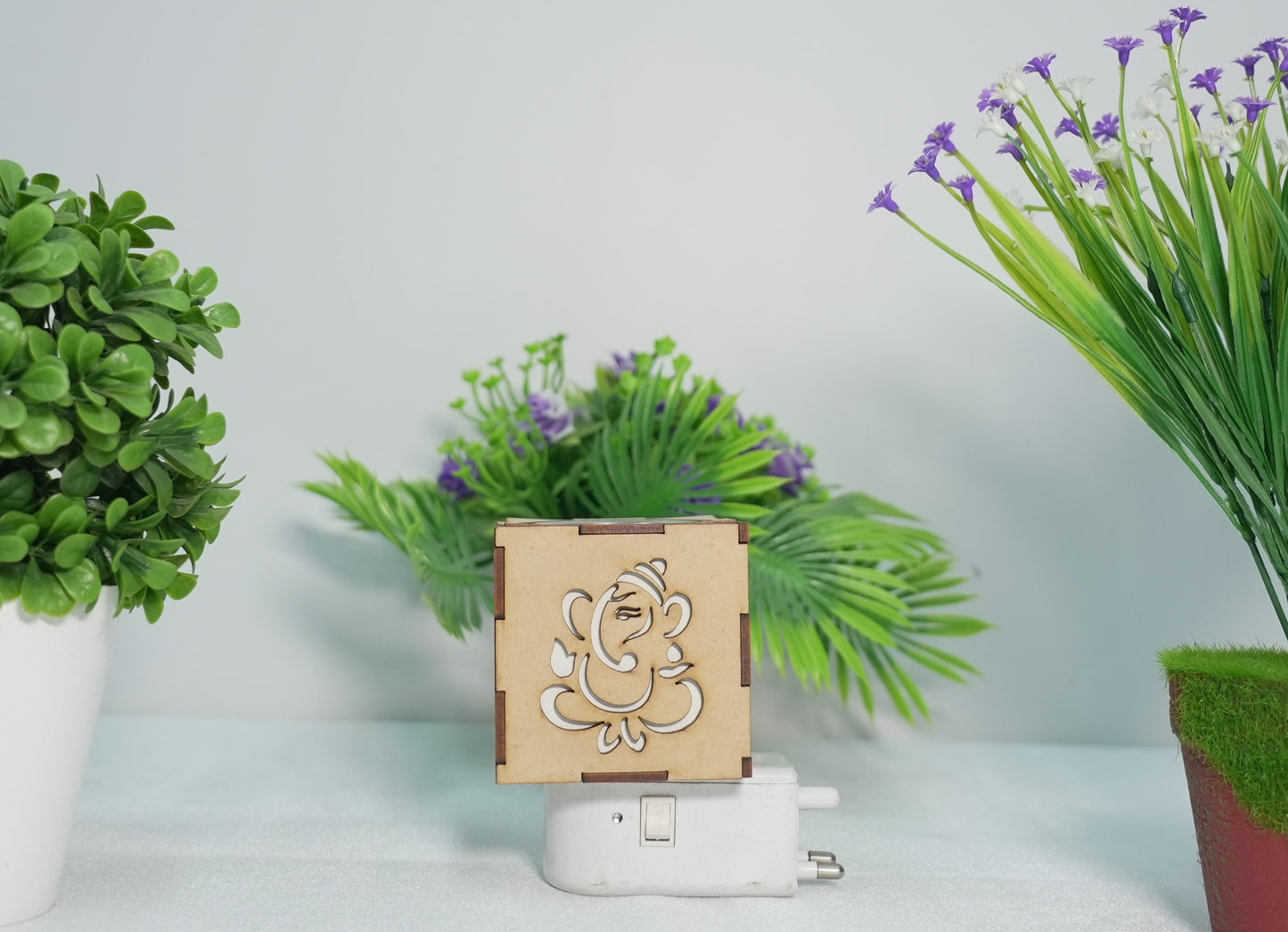 Multicolor Ganesha aroma burner and night lamp from 18309, featuring a decorative Ganesha figure and soft lighting for ambiance.
