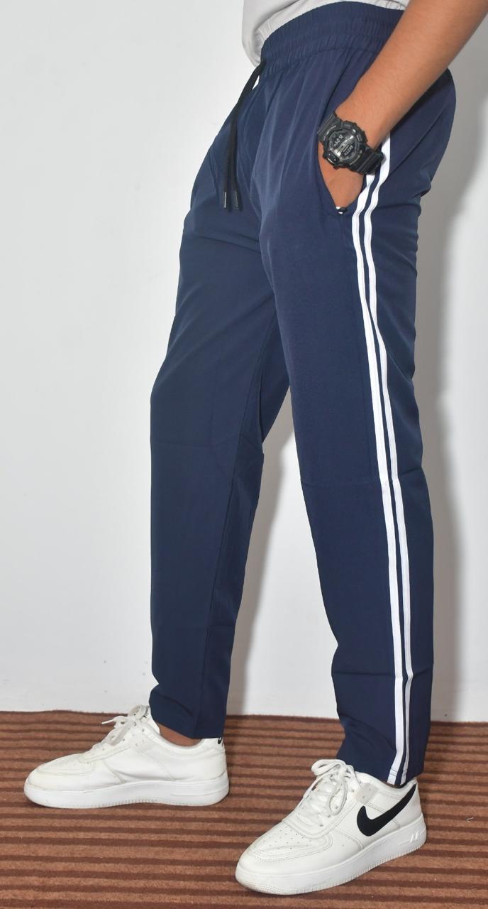 Multicolor boys' track pants and joggers by 18359, casual athletic wear with elastic waistband and tapered fit.