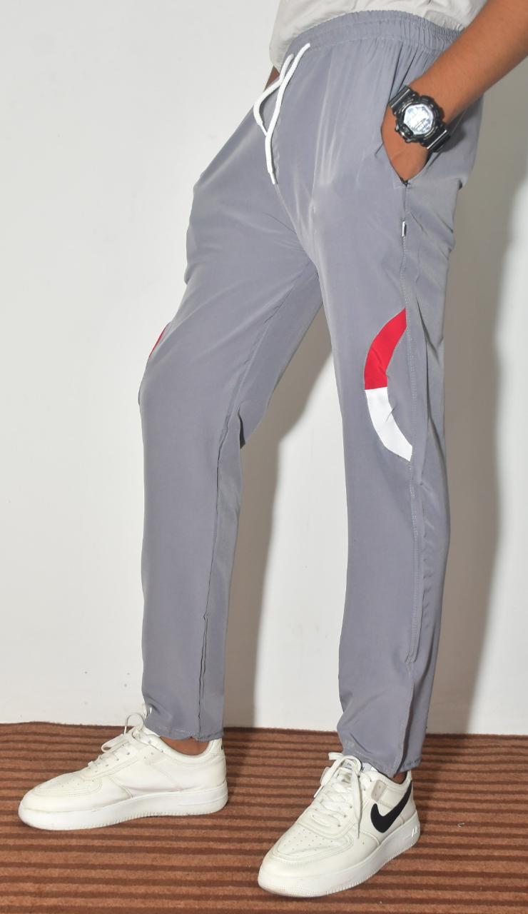 Boys multicolor track pants with solid and striped pattern, men's joggers made by 18359, comfortable athletic wear for boys.