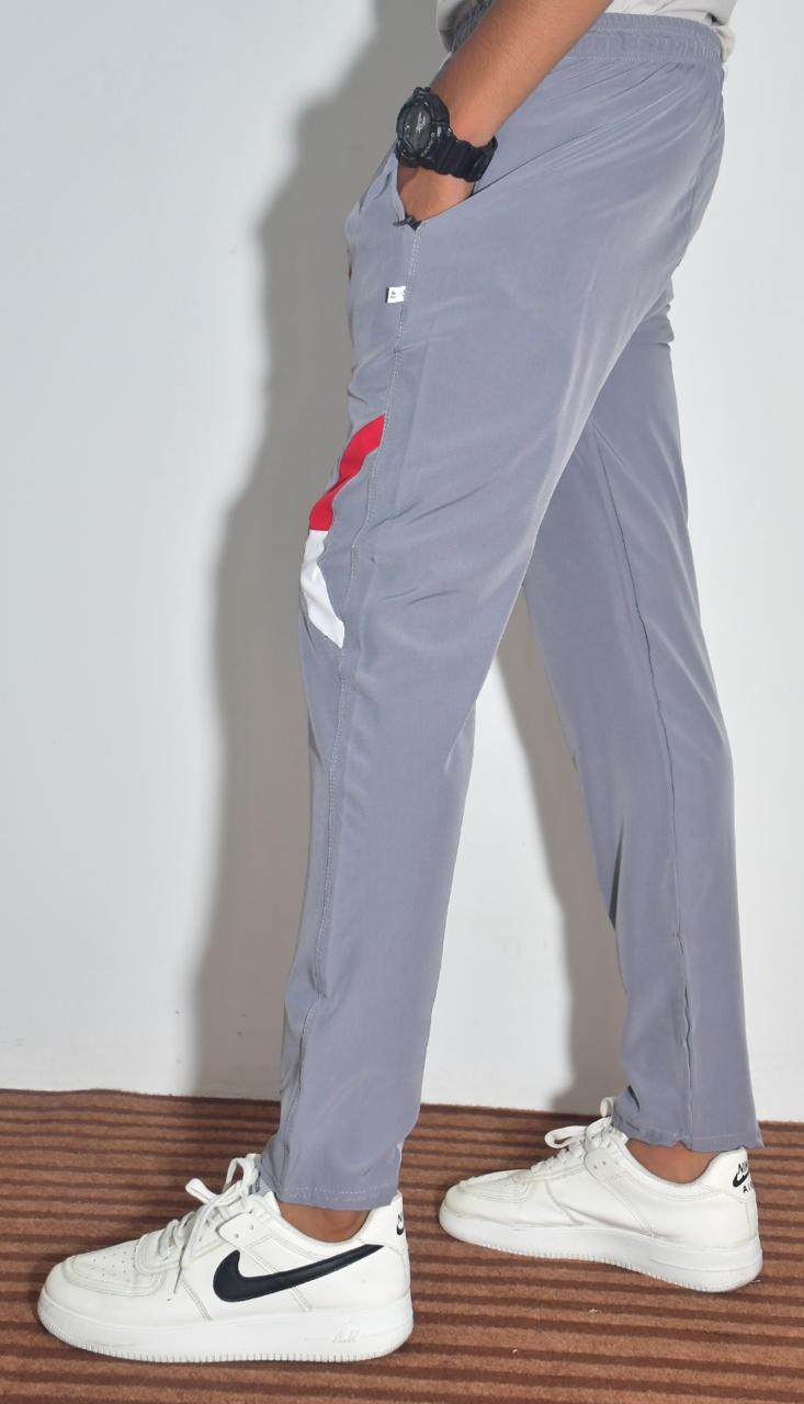 Multicolor boys' track pants by 18359 featuring solid and striped design, comfortable joggers for boys.