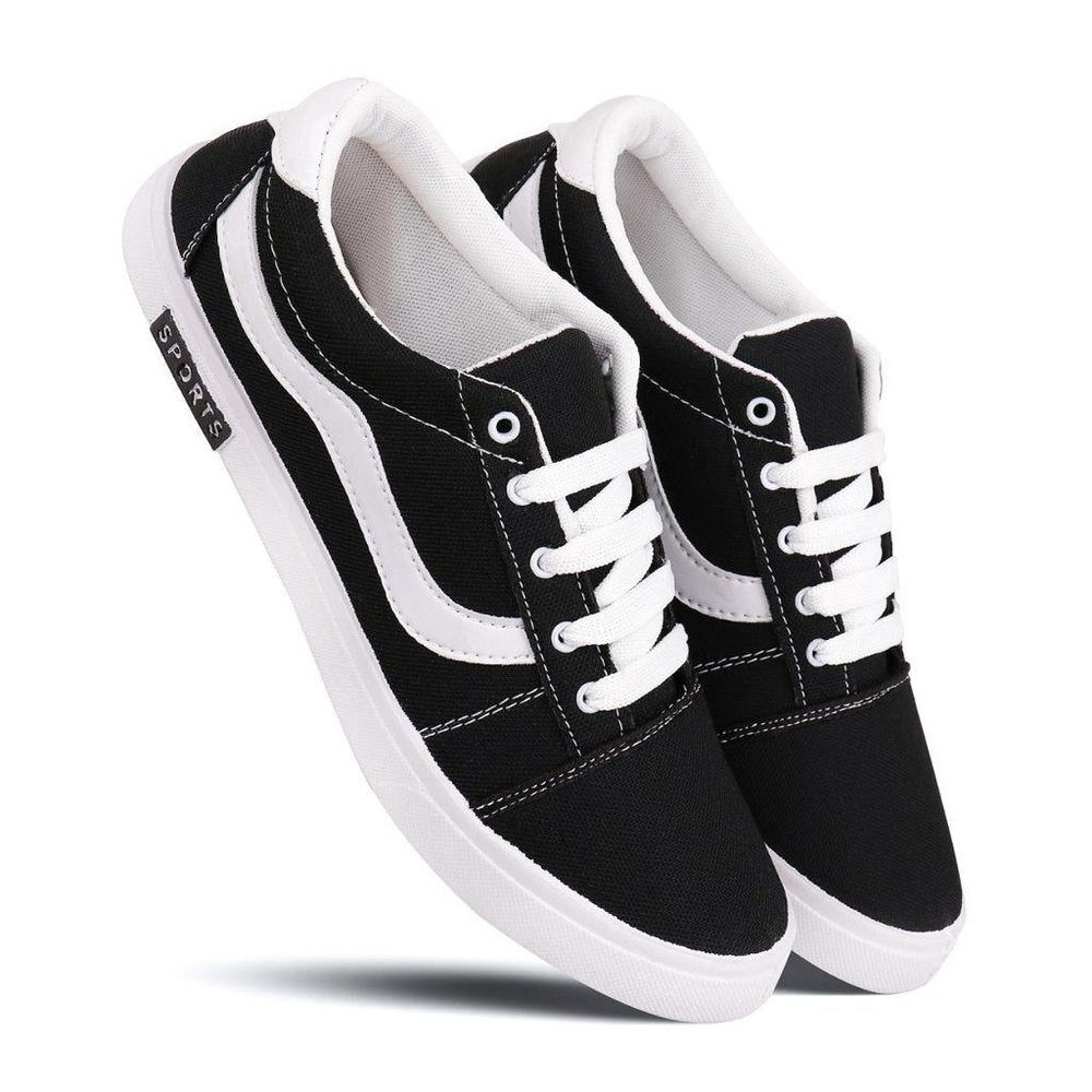 Black and white men's casual shoes by 18549, size 6, featuring a comfortable slip-on design for everyday wear.