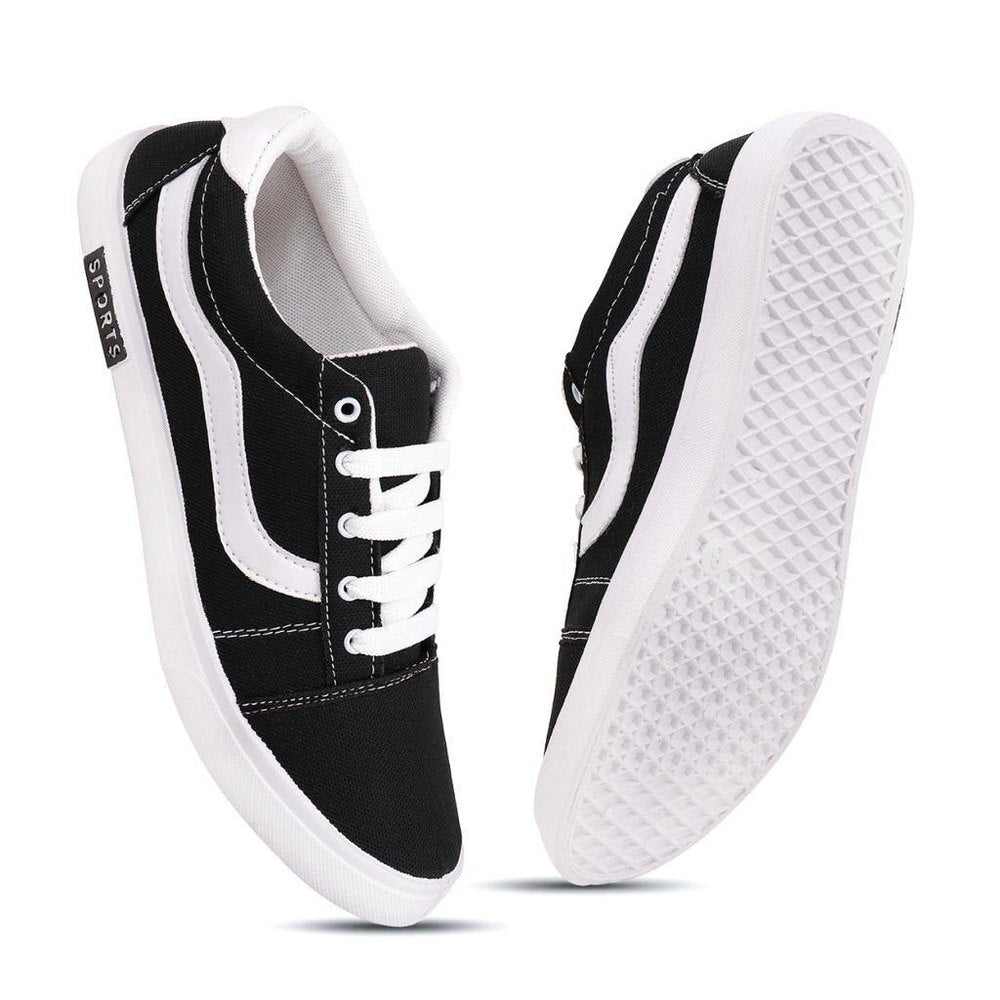 Men's casual shoes in black and white, size 6, with comfortable slip-on design by 18549.
