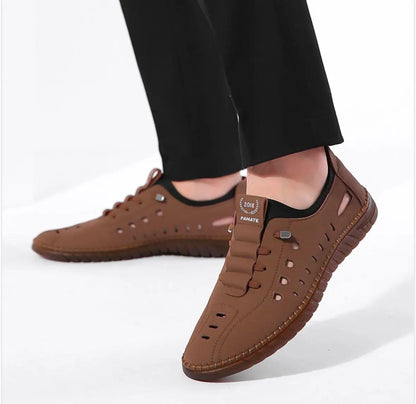 Men's stylish laser-cut tan casual shoes with breathable design and sleek look, perfect for everyday wear.