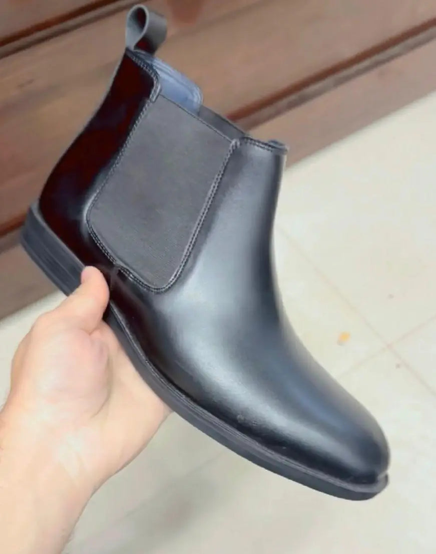 Men's casual synthetic boots from 18644, showcasing stylish and comfortable men's casual shoes with a sleek design.