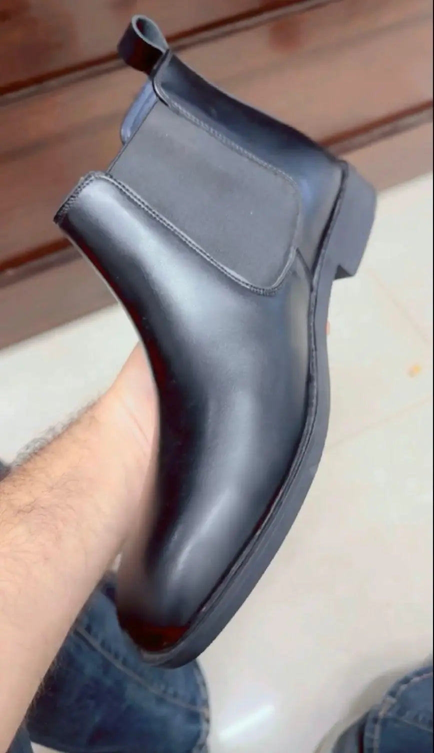 Men's casual synthetic boots from 18644, featuring a stylish design and sturdy construction, suitable for everyday wear.