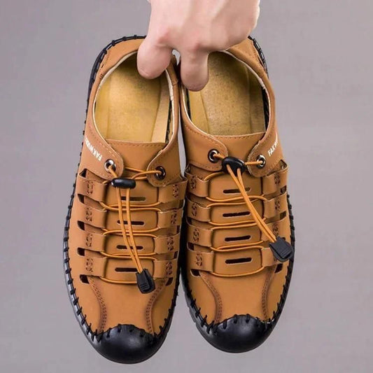 Men's stylish casual shoes in black leather with white soles, designed for comfort and everyday wear.