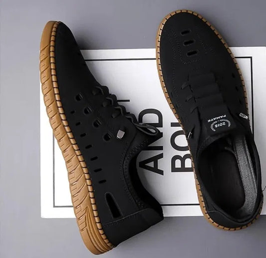 Men's casual black shoes by 18644, featuring a sleek design and comfortable fit, perfect for everyday wear.