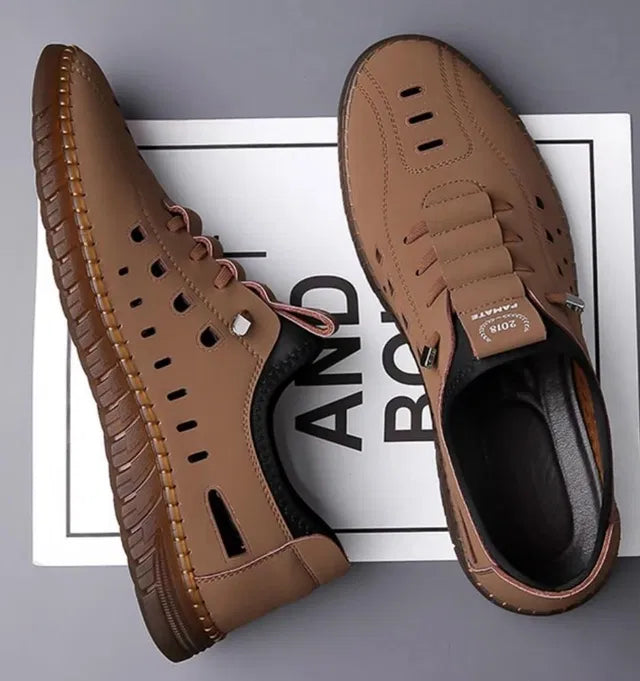 Men's casual brown shoes by 18644, featuring a sleek design and comfortable fit, shown in a close-up image.