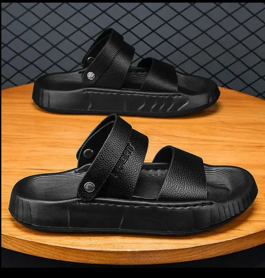 Black men's sandal by 18644 featuring open-toe design and adjustable straps, perfect for casual summer wear.