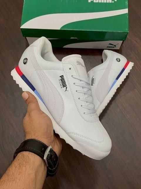 White men's sneakers by 18644, size 6, featuring a sleek design and comfortable fit for casual wear.